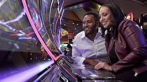 Filipino player enjoying ez2 history sports and slots on a mobile phone